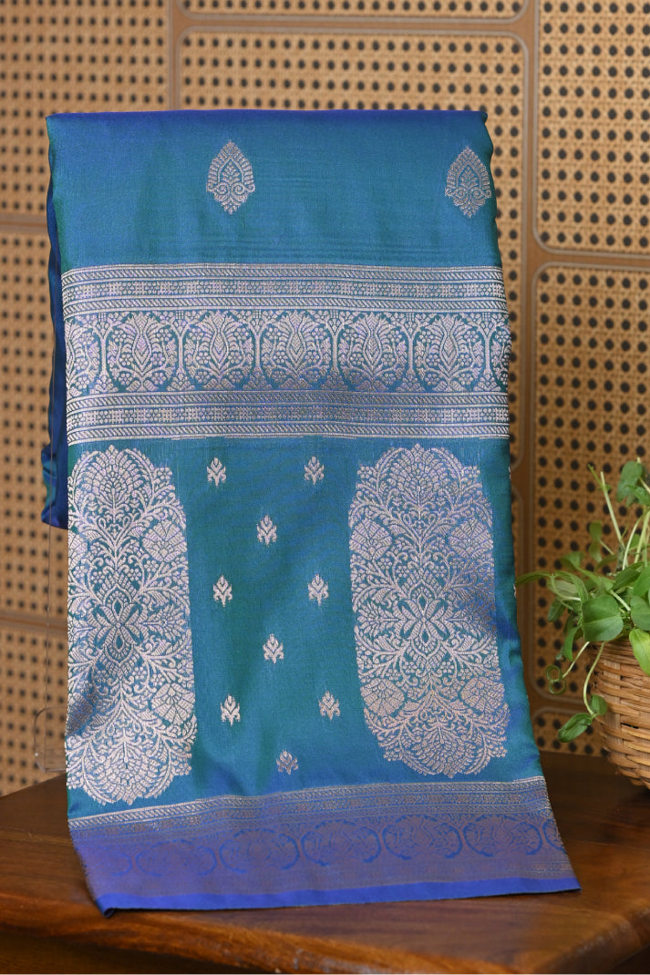 Semi-banarasi Saree with traditional butta and golden zari pallu